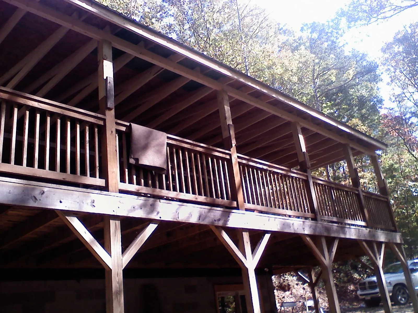 Timber framing under a new elevated porch and deck — Roof Leak Repair in Langlois by Roofing Brothers